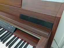 Load image into Gallery viewer, YAMAHA CLAVINOVA CLP-270 DIGITAL PIANO AND STOOL IN MAHOGANY FINISH stock #24359