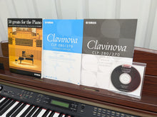 Load image into Gallery viewer, YAMAHA CLAVINOVA CLP-270 DIGITAL PIANO AND STOOL IN MAHOGANY FINISH stock #24359