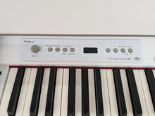 Load image into Gallery viewer, Roland F120R compact slim size Digital Piano and stool in white stock # 24364