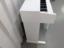 Load image into Gallery viewer, Yamaha Arius YDP-144 digital piano and stool in satin white stock nr 24365