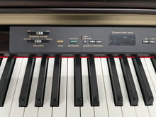 Load image into Gallery viewer, Yamaha Clavinova CLP-130 Digital Piano and stool in dark rosewood stock #24381