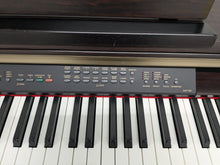 Load image into Gallery viewer, Yamaha Clavinova CLP-130 Digital Piano and stool in dark rosewood stock #24381