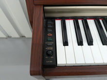 Load image into Gallery viewer, Yamaha Clavinova CLP-220 digital piano and stool in mahogany finish stock #24403