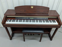 Load image into Gallery viewer, Yamaha Clavinova CLP-150 digital piano and stool in mahogany stock #24409