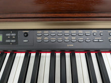 Load image into Gallery viewer, Yamaha Clavinova CLP-150 digital piano and stool in mahogany stock #24409
