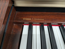 Load image into Gallery viewer, Yamaha Clavinova CLP-150 digital piano and stool in mahogany stock #24409