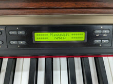 Load image into Gallery viewer, Yamaha Clavinova CLP-150 digital piano and stool in mahogany stock #24409