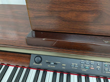 Load image into Gallery viewer, Yamaha Clavinova CLP-150 digital piano and stool in mahogany stock #24409