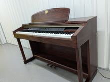 Load image into Gallery viewer, Yamaha Clavinova CLP-150 digital piano and stool in mahogany stock #24409