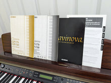 Load image into Gallery viewer, Yamaha Clavinova CLP-150 digital piano and stool in mahogany stock #24409