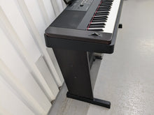 Load image into Gallery viewer, Yamaha DGX-650 in black 88 Weighted Keys Portable Grand 3 pedals stock #24407