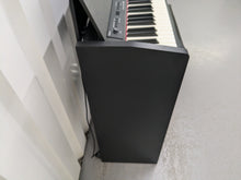 Load image into Gallery viewer, Roland F120R compact slim size Digital Piano and stool in black stock # 24410