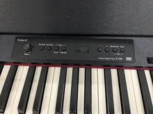 Load image into Gallery viewer, Roland F120R compact slim size Digital Piano and stool in black stock # 24410