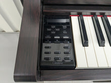 Load image into Gallery viewer, Yamaha Clavinova CLP-575 digital piano and stool in dark rosewood finish stock #24411