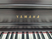 Load image into Gallery viewer, Yamaha Clavinova CLP-575 digital piano and stool in dark rosewood finish stock #24411