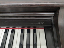 Load image into Gallery viewer, Casio Celviano AP-38 digital piano in dark rosewood stock number 24414