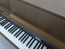 Load image into Gallery viewer, Roland LX-7 Luxury Digital Piano and stool in brown walnut finish Stock nr 24416