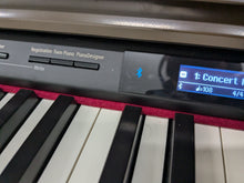 Load image into Gallery viewer, Roland LX-7 Luxury Digital Piano and stool in brown walnut finish Stock nr 24416