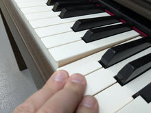 Load image into Gallery viewer, Roland LX-7 Luxury Digital Piano and stool in brown walnut finish Stock nr 24416