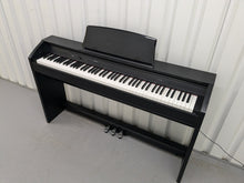 Load image into Gallery viewer, Casio Privia PX-750 Slim Digital Piano in satin black space saving stock # 24427