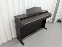 Load image into Gallery viewer, Roland HP103e digital piano in mahogany finish stock number 24431
