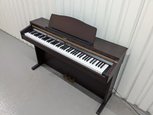 Load image into Gallery viewer, Roland HP103e digital piano in mahogany finish stock number 24431