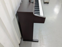 Load image into Gallery viewer, Roland HP103e digital piano in mahogany finish stock number 24431