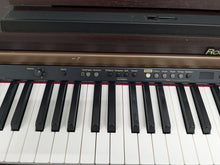 Load image into Gallery viewer, Roland HP103e digital piano in mahogany finish stock number 24431