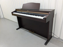 Load image into Gallery viewer, Roland HP103e digital piano in mahogany finish stock number 24431