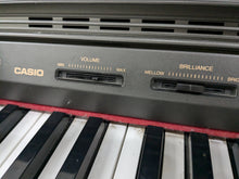 Load image into Gallery viewer, Casio Celviano AP-45 Digital Piano in dark rosewood finish, hammer action stock # 24429