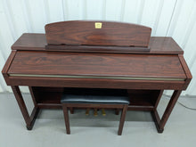 Load image into Gallery viewer, Yamaha Clavinova CLP-150 digital piano and stool in mahogany stock #24447