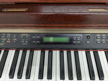 Load image into Gallery viewer, Yamaha Clavinova CLP-150 digital piano and stool in mahogany stock #24447
