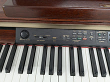 Load image into Gallery viewer, Yamaha Clavinova CLP-150 digital piano and stool in mahogany stock #24447