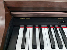 Load image into Gallery viewer, TECHNICS SX-PX552 DIGITAL PIANO AND STOOL IN MAHOGANY stock number 24460