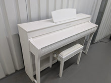 Load image into Gallery viewer, Yamaha Clavinova CLP-735 in satin white with heigh-adjustable stool stock nr 24465