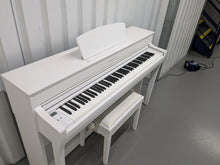 Load image into Gallery viewer, Yamaha Clavinova CLP-735 in satin white with heigh-adjustable stool stock nr 24465