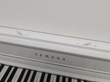 Load image into Gallery viewer, Yamaha Clavinova CLP-735 in satin white with heigh-adjustable stool stock nr 24465