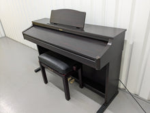 Load image into Gallery viewer, Roland HP-2e digital piano and stool in dark rosewood finish stock number 24464