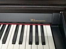 Load image into Gallery viewer, Roland HP-2e digital piano and stool in dark rosewood finish stock number 24464
