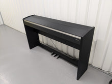 Load image into Gallery viewer, Roland F110 compact slim size Digital Piano in black stock # 24479