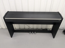 Load image into Gallery viewer, Roland F110 compact slim size Digital Piano in black stock # 24479