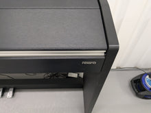 Load image into Gallery viewer, Roland F110 compact slim size Digital Piano in black stock # 24479