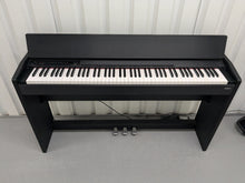 Load image into Gallery viewer, Roland F110 compact slim size Digital Piano in black stock # 24479