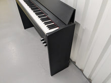 Load image into Gallery viewer, Roland F110 compact slim size Digital Piano in black stock # 24479