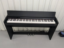 Load image into Gallery viewer, Roland F110 compact slim size Digital Piano in black stock # 24479