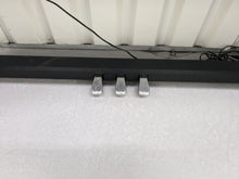 Load image into Gallery viewer, Roland F110 compact slim size Digital Piano in black stock # 24479