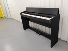 Load image into Gallery viewer, Roland F110 compact slim size Digital Piano in black stock # 24479