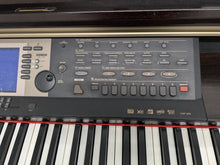 Load image into Gallery viewer, Yamaha Clavinova CVP-205 in rosewood with big speakers in base stock nr 24471