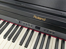 Load image into Gallery viewer, Roland RP301 digital piano in satin black finish stock number 24489