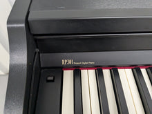 Load image into Gallery viewer, Roland RP301 digital piano in satin black finish stock number 24489